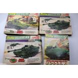 Four boxed and unopened Dinky Military Kits diecast metal to include 1034 155mm Mobile Gun, 1035
