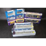 12 Boxed OO gauge items of rolling stock to include Bachmann x 2, Electrotren x 4, Dapol x 5 and