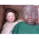 Two Armand Marseille dolls to include black doll marked 351/9k 21" in height and another marked