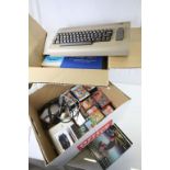 Gaming - Commodore computer console plus 22 cassette games and a boxed Cheetah joystick