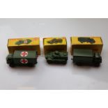 Three boxed Dinky military vehicles to include 623 Army Covered Wagon, 626 Military Ambulance and