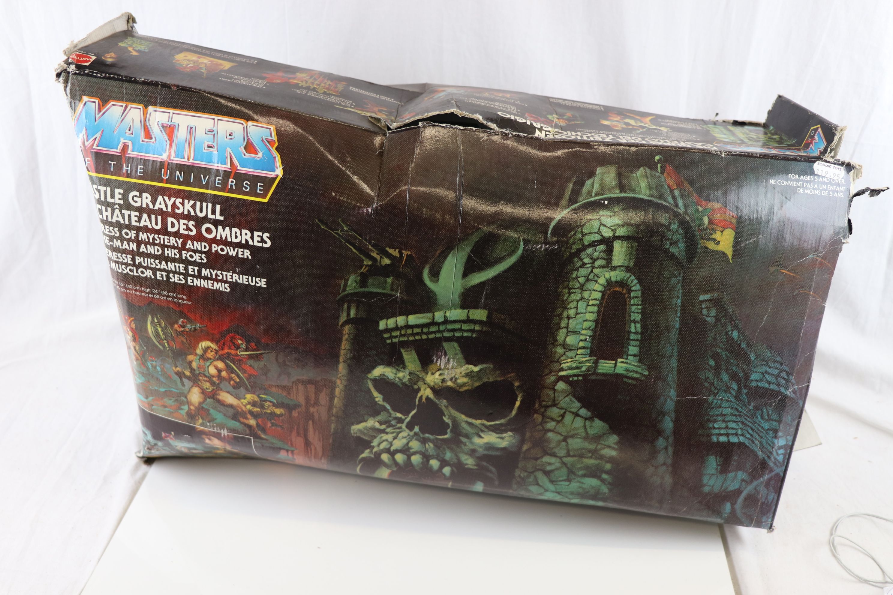 Original boxed He-Man Masters of the Universe Castle Grayskull in gd condition with poor box