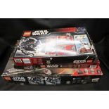 Four boxed Lego Star Wars sets to include 7663, 6211, 7661 & 6205, unchecked