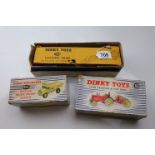 Three boxed Dinky Supertoys to include 310 Farm Tractor & Hay Rake, 965 Euclid Rear Dump Truck & 982