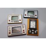 3 unboxed Nintendo Game & Watch games to include Fire, Vermin & Snoopy Tennis. Sold with an Epoch