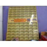 1970s Matchbox 75 diecast model hanging shop display, slight discolouring, many of the numbers