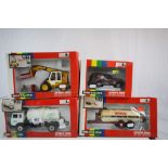Four boxed Britains mode;s to include 9605 Leyland Milk Transporter, 9480 Land Rover Discovery, 9563
