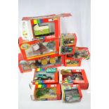 11 Boxed Britains farming models to include 9566 Class Tipping Silage Trailer, 9432 Farm Tractor and