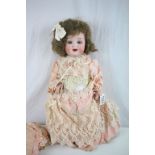 Heubach Koppelsdorf doll, bisque head, teeth, sleeping glass eyes in original dress, hair loose from