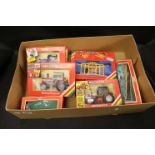 Six boxed Britains farming vehicles and accessories to include 9520 Massey Ferguson Tractor
