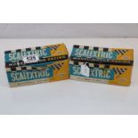 Two boxed Triang Scalextric slot cars to include C54 Lotus in yellow and E/4 Ferrari GT in red