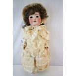 Heubach Koppelsdorf doll, bisque head, teeth, with eyes loose within head, marked 320-5 to neck, 18"