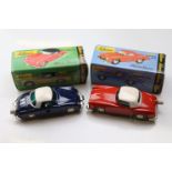 Two boxed Schuco Micro Racer clockwork diecast model vehicles to include 1044 Mercedes 190 SL in red
