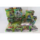 Nine carded & unopened Teenage Mutant Ninja Turtles figures to include Casey Jones & Michelangelo (