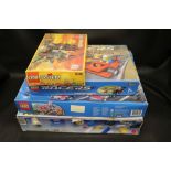 Four boxed Lego sets to include System 6456 and 6048, Racers Super Speedway game and City 7945,