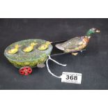 Early 20th C Lehmann 645 Quack Quack / Paak Paak tinplate model of a duck pulling three ducklings in