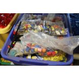 Large tub of Lego bricks in various colours and numerous minifigures