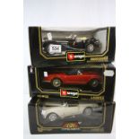 Three boxed Burago diecast models to include Lancia Aurelia B24 Spider (1955) x 2 in red and cream