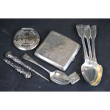 Two Victorian silver fiddle, thread and shell pattern crested dessert spoons, makers Chawner & Co (