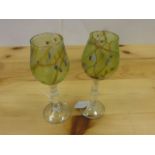 Pair of Carin Von Drehle (American) irridescent wine glasses, colourless glass double baluster