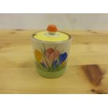 Clarice Cliff for Newport Pottery crocus pattern preserve pot and cover, yellow, pink and blue