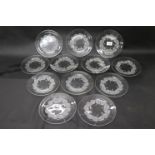 Twelve Lalique Rolleboise clear and frosted glass salad plates, frosted leaf design in circular