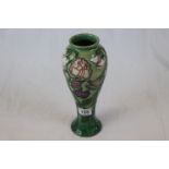 Moorcroft Collectors Club sweet pea vase of inverse baluster form, green ground with pink and purple