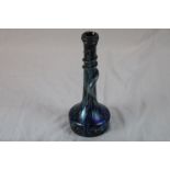 Late 20th century iridescent studio glass vase in the Okra style, black ground with irregular