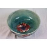 Moorcroft Anemone pattern bowl, green ground with red and purple anemone decoration, mid 20th