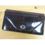 A vintage tortoiseshell and leather ladies wallet purse, press stud clasp with applied floral