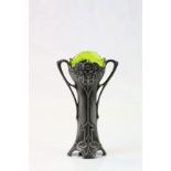 A WMF Jugendstil electroplated twin handled bud vase, cast with flowers on sinuous stems terminating