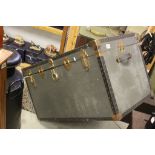 Large grey travelling trunk