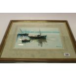 Oil painting of fishing boats on lake Geneva, indistinctly signed.