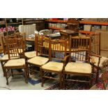 Set of Eight Oak Lancashire Style Spindle Back Dining Chairs with String Seats (including two