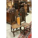 Pair of 17th / 18th century Oak High Back Side Chairs with arched panel backs and solid seats raised