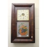Wooden cased Key wind American wall clock with painted glazed panel to the front by Ansonia