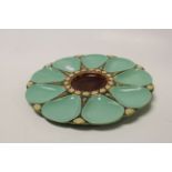 Five Victorian Minton Majolica oyster plates two with brown centres and three with green centres,
