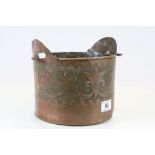 Arts & Crafts Copper bucket with swing handle and a Floral design