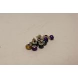 Fourteen paste and white metal charms to include one marked Pandora (14)