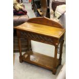 Oak Gothic Style Hall Table with Carved Arched Back and Single Drawer above a Shelf below