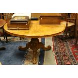 Victorian Burr Walnut Inlaid and Walnut Circular Tilt Top Centre Table raised on a large carved