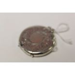 Silver circular vesta case, engraved foliate decoration around central blank cartouche, makers