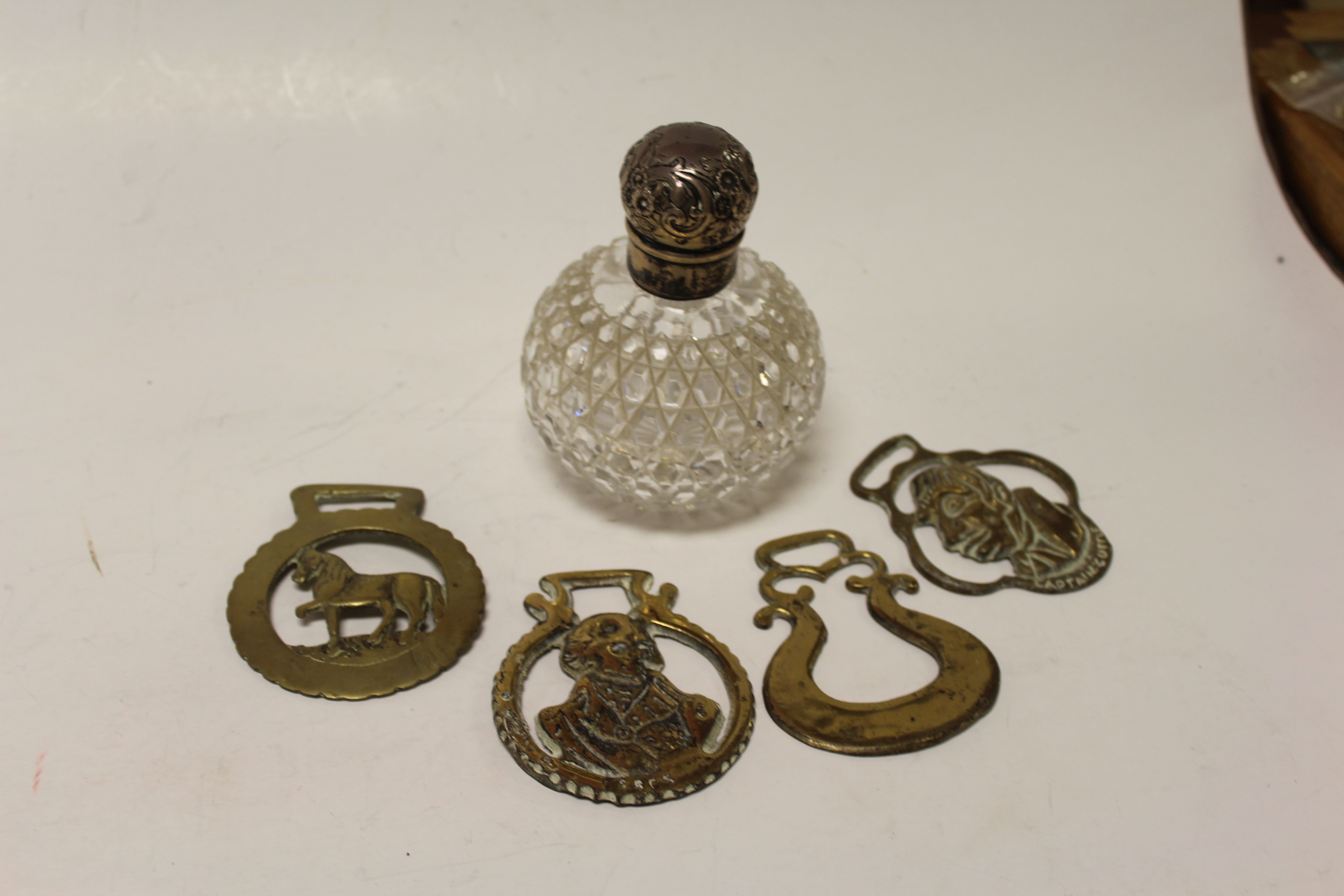 Victorian Cut Glass Bulbous Perfume Bottle with Silver Top together with a Copper Chestnut - Image 2 of 2