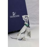 Swarovski crystal figure of a stylised cat with green crystal collar, boxed, height approximately