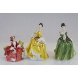 Three Royal Doulton ceramic figurines to include; HN1908, HN2807, HN2368
