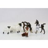 Small group of Beswick ceramic animals to include; two Foals, two Sheep and a seated Fox