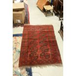 Middle Eastern rug in dark red