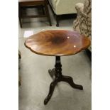Early 19th century Mahogany Tilt Top Table with Oval Top and tripod legs