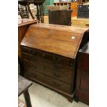 George III Mahogany Bureau, the front dropping down to reveal a fitted interior over four long