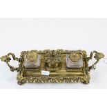 19th Century gilt Brass ink stand with floral design and two Brass topped glass inkwells